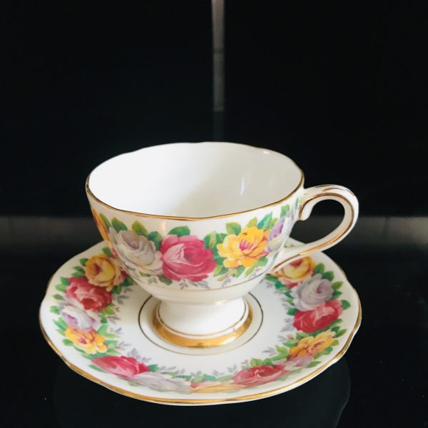 Gladstone England Tea cup and saucer large wreath of cabbage rose pink yellow white Fine bone china farmhouse collectible display bridal