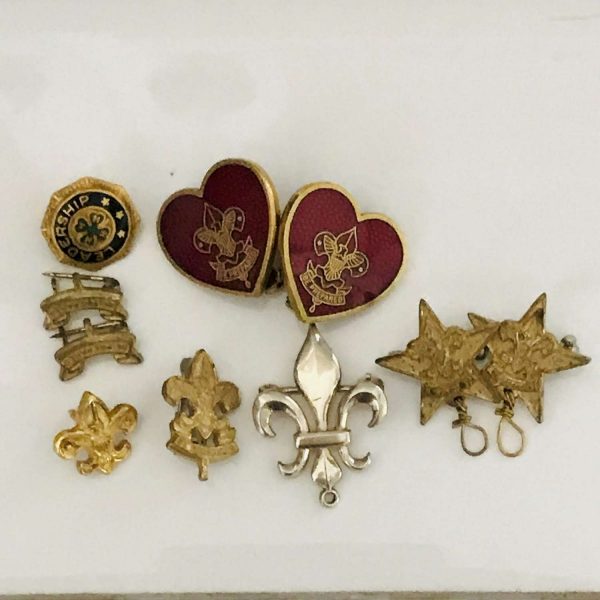 Lot of 10 Vintage Girl Scout Pins Various sizes shapes Leadership, be prepared, 2 enameled 2 with charm hooks, 2 tiny be prepared (top left)