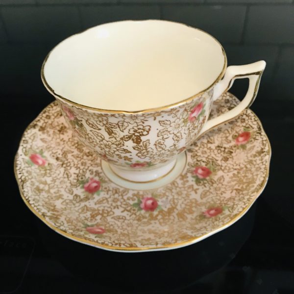 Melba Tea cup and saucer Chintz Pink background gold & dark pink cabbage Roses England Fine bone china cottage dining serving coffee