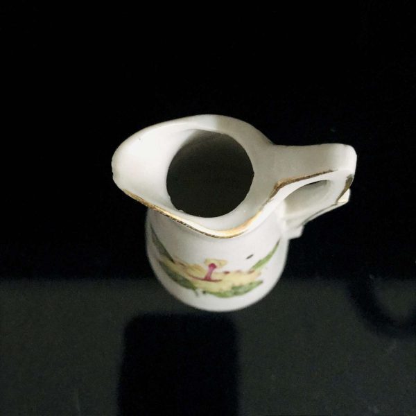 Miniature Ewer pitcher fine china yellow flower gold trimmed handle Japan