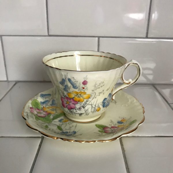 Paragon Tea Cup and Saucer England light yellow backgroun Bright yellow pink green blue flowers bridal Collectible Display Cottage coffee