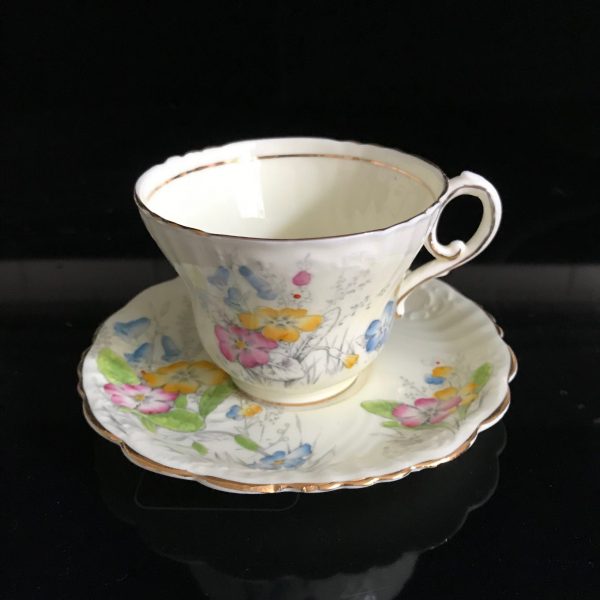 Paragon Tea Cup and Saucer England light yellow backgroun Bright yellow pink green blue flowers bridal Collectible Display Cottage coffee