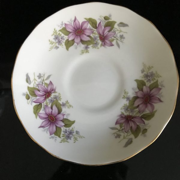 Queen Anne tea cup and saucer England Fine bone china Purple flowers with red centers gold trim farmhouse collectible display dining coffee