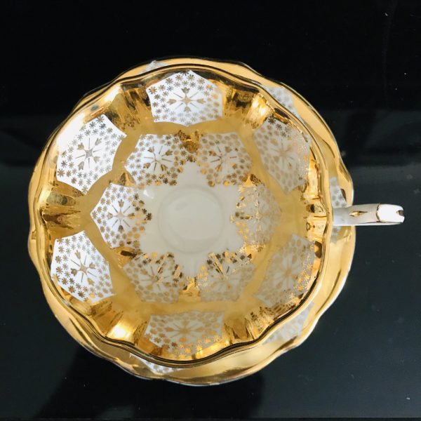 Queen Anne tea cup and saucer England Fine bone Gold with White and gold geometric design fine detail stunning heavy gold display bridal