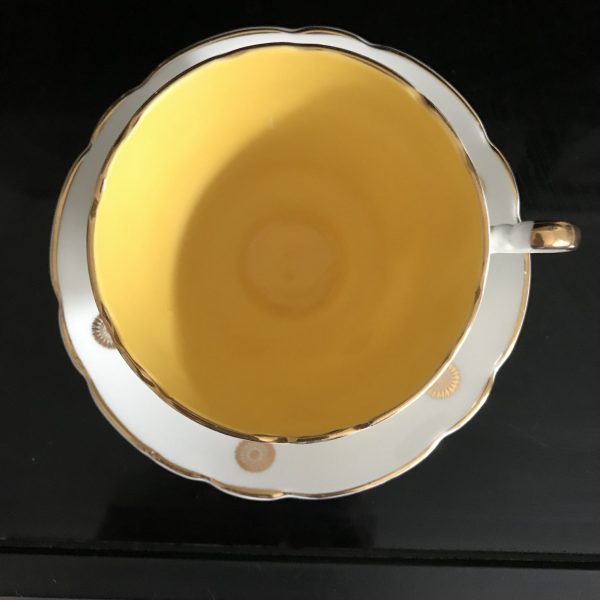 Regency Tea cup and saucer England Fine bone china Bright Sunshine Yellow inside gold spirals out farmhouse collectible display bridal