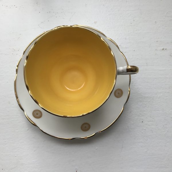 Regency Tea cup and saucer England Fine bone china Bright Sunshine Yellow inside gold spirals out farmhouse collectible display bridal