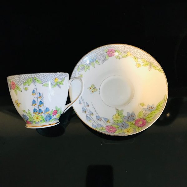Rosina tea cup and saucer England Fine bone china Blue Bells Yellow Pink gold trim farmhouse collectible display
