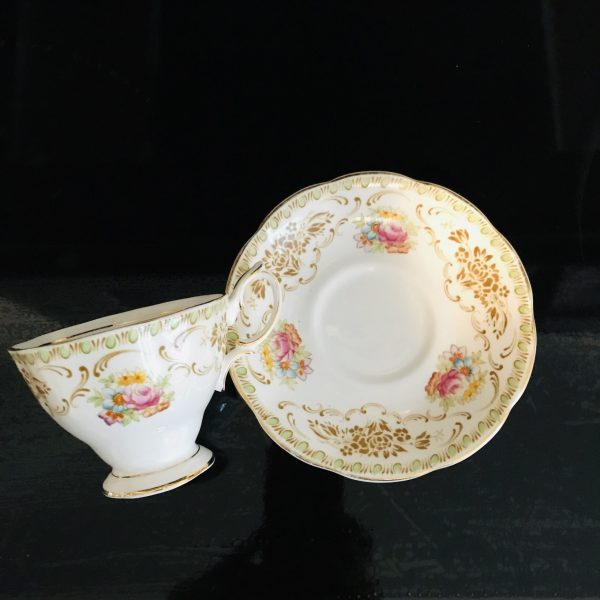 Royal Albert tea cup and saucer England Fine bone china Boquets with scrolls gold trim farmhouse collectible display coffee serving