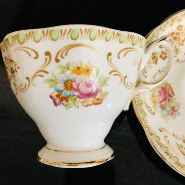 Royal Albert tea cup and saucer England Fine bone china Boquets with scrolls gold trim farmhouse collectible display coffee serving