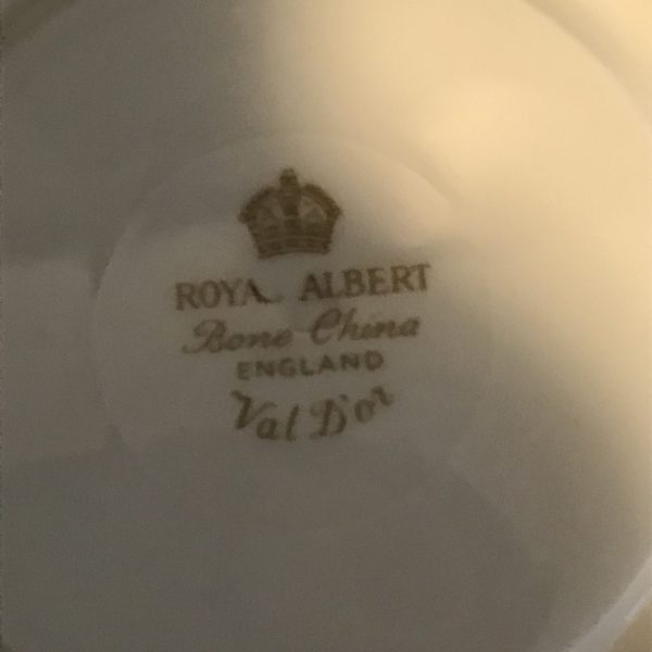 Royal Albert tea cup and saucer England Fine bone china White with gold trim farmhouse collectible display coffee serving sleek
