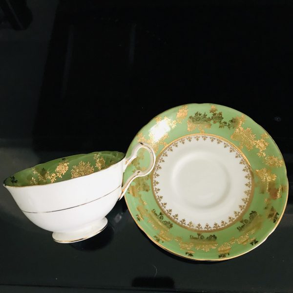 Royal Grafton Tea cup and saucer England Fine bone china medium green heavy gold ornate accents center collectible display coffee