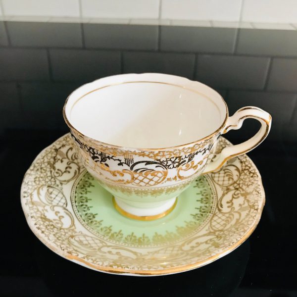 Royal Stafford Tea cup and saucer England Fine bone china mint green with heavy gold scrolls & flowers farmhouse collectible display cottage