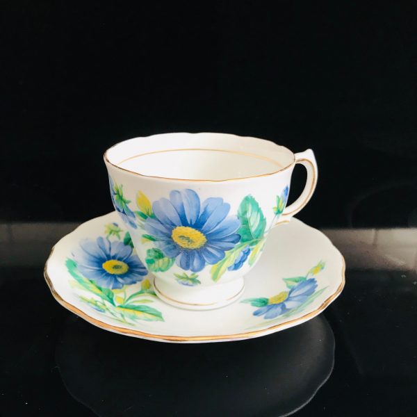 Royal Vale Tea cup and saucer England Fine bone china Blue Daisies with yellow centers farmhouse collectible display bridal