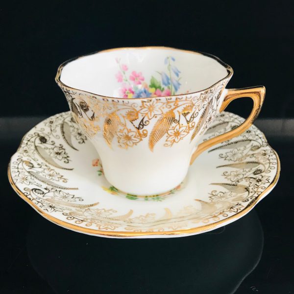 Sandringham Tea Cup and Saucer Fine bone china England heavy gold floral outside bouquet inside pink blue orange yellow purple Display