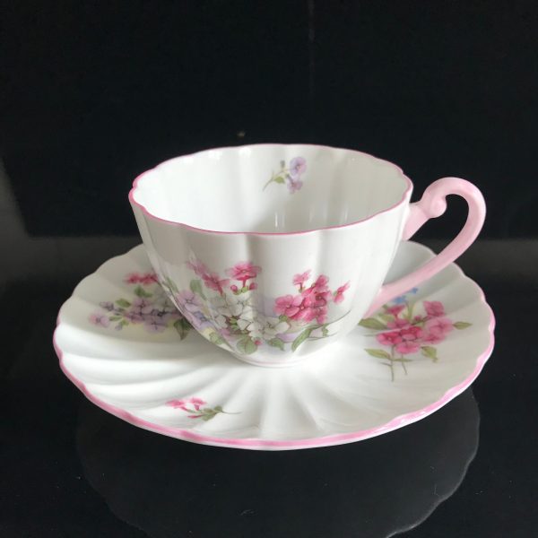 Shelley Tea cup and saucer England Fine bone china Pink Lavender blue & white dainty flowers pink handle farmhouse collectible display