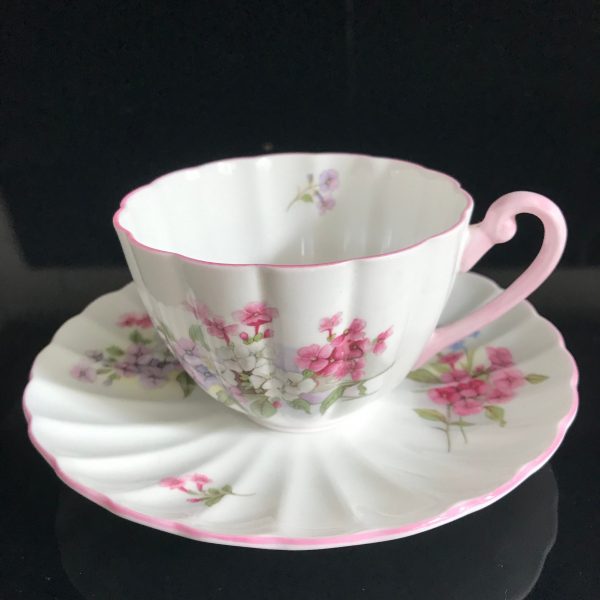 Shelley Tea cup and saucer England Fine bone china Pink Lavender blue & white dainty flowers pink handle farmhouse collectible display