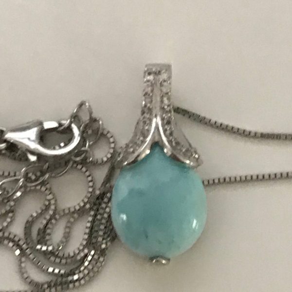 Sterling Silver Box Chain with light blue stone and crystal pendant adjustable chain both pieces marked .925 RGN