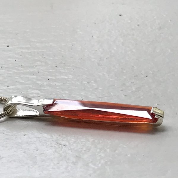 Sterling Silver Snake Necklace with bright red/orange faceted rectangle stone