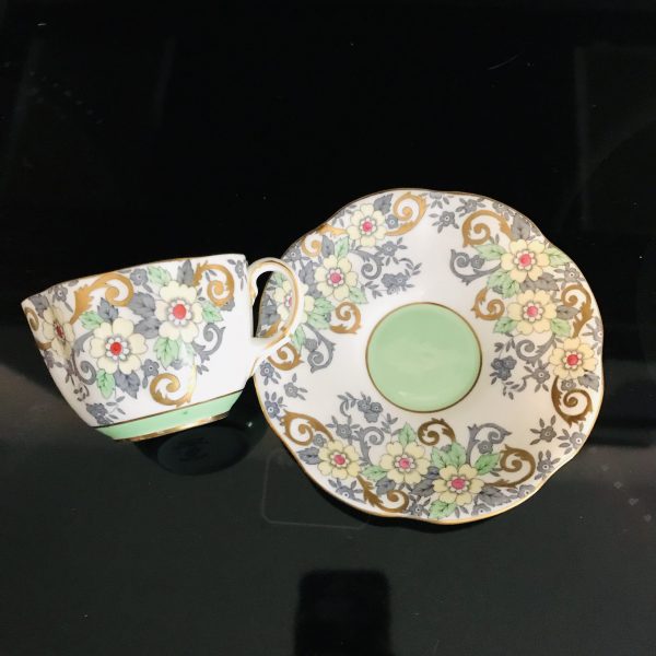 Taylor Kent tea cup and saucer England Fine bone china yellow floral green leaves gold trim farmhouse collectible display coffee