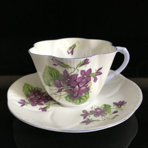 Tea cup and saucer Shelley England Fine bone china purple Violets yellow centers lavender trim & handle farmhouse collectible display coffee