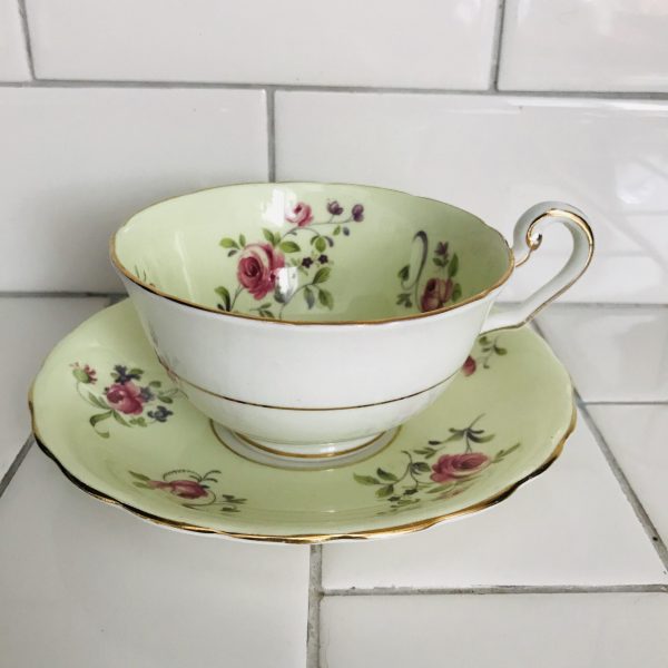 Victoria England Tea cup and saucer dainty flowers mint green background Fine bone china farmhouse collectible display cottage bridal