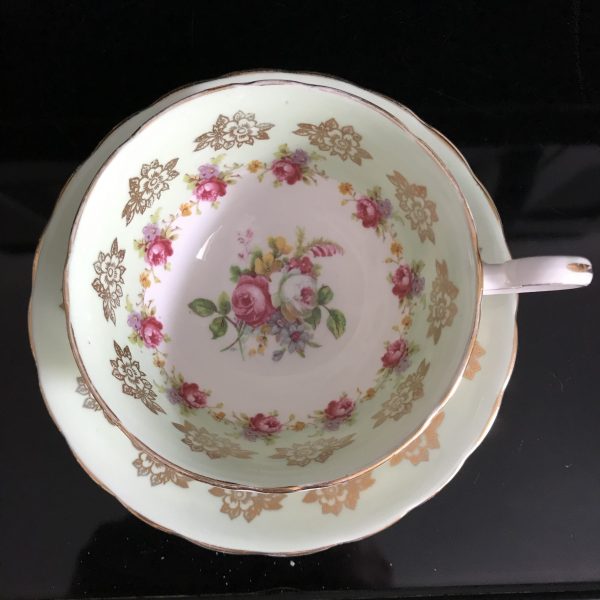Victoria England Tea cup and saucer dainty flowers mint green cabbage rose background Fine bone china farmhouse collectible display cottage