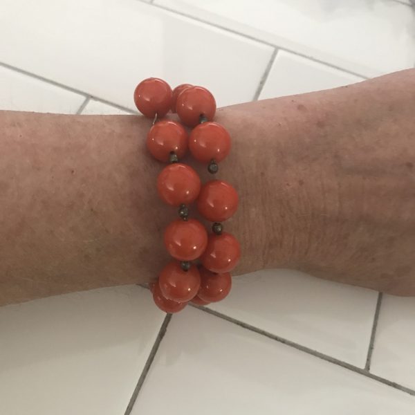 Vintage beaded wrap bracelet with one dangling bead 12" long Orange