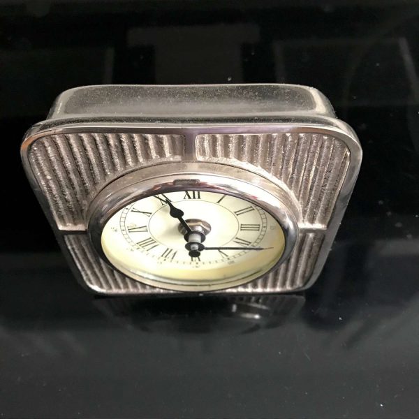 Vintage chrome clock designed to look like vintage auto gauge quartz working clock