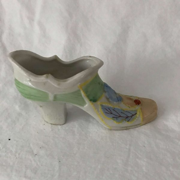 Vintage Collectible Porcelain Shoe Figurine Floral pattern high heel with blue flower and leaves iridescent toe