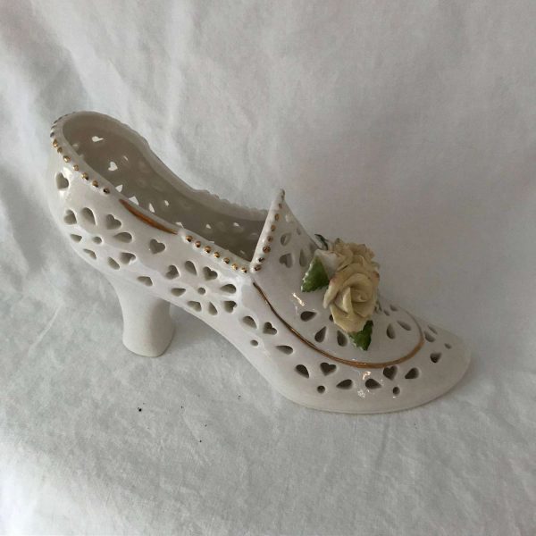 Vintage Collectible Porcelain Shoe Figurine Floral pattern high heel with piercings yellow roses on the toe gold trim
