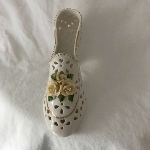 Vintage Collectible Porcelain Shoe Figurine Floral pattern high heel with piercings yellow roses on the toe gold trim