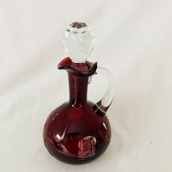 Vintage Crystal Cruet Red cut to clear Made in Romania Beautiful etched flowers & leaves Clear applied handle and clear stopper ground