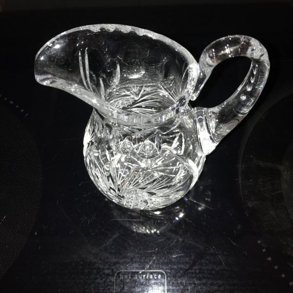 Vintage crystal syrup pitcher American Brilliant Pattern with cut rim and thumbprint at top collectible fine dining elegant