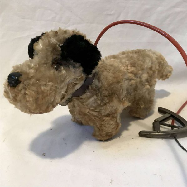 Vintage Dog stuffed with wheels and jumping mechanism collectible display movie prop tv prop stuffed animal