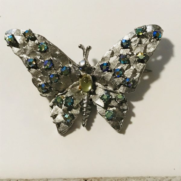 Vintage Estate Pin Brooch Aurora Borealis butterfly with yellow center stone Signed Silver Starrs on silver tone matt backing blue purple