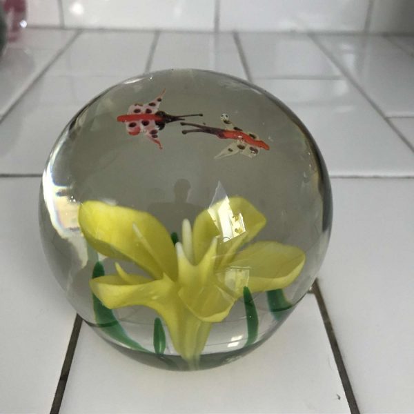 Vintage glass paperweight Yellow flower green leaves and 2 butterflies in the top over the flower collectible display home decor