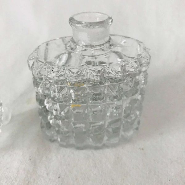 Vintage glass perfume bottle with ground glass stopper mid century clear display vanity collectible