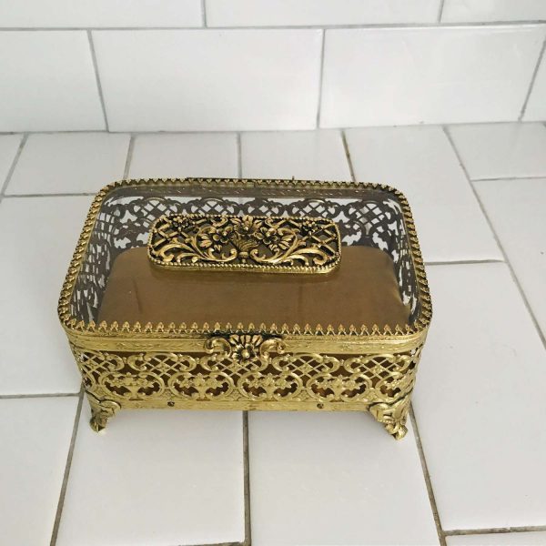 Vintage Gold Filigree Jewelry Box with glass lid and ornate trim top collectible vintage display beveled glass top