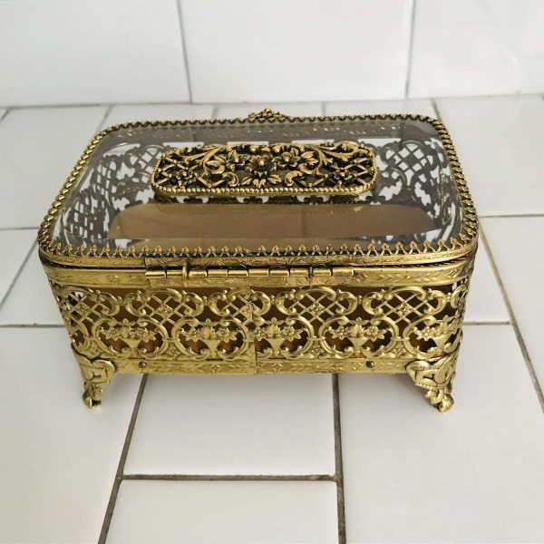 Vintage Gold Filigree Jewelry Box with glass lid and ornate trim top collectible vintage display beveled glass top
