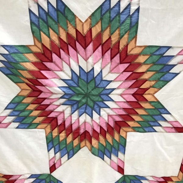 Vintage hand made quilt topper lined but not filled light weight Texas Star or Sunflower Blue trim Red pink blue peach green body