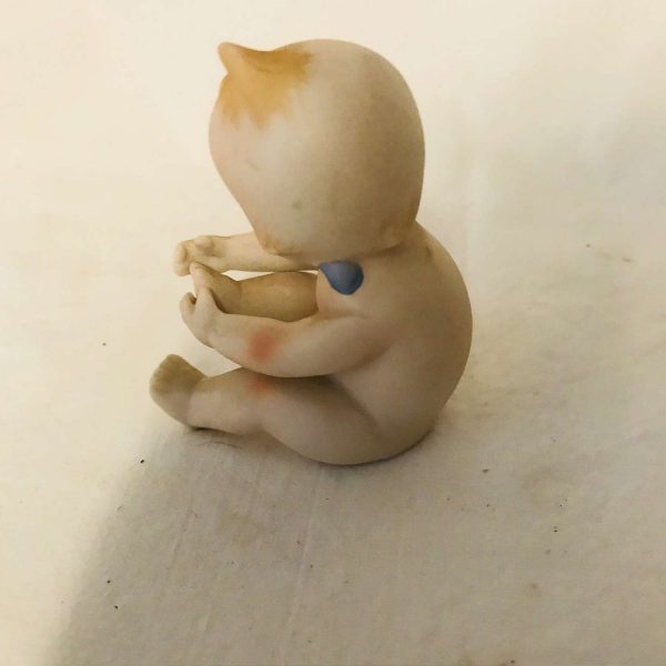 Vintage Kewpie Doll bisque cherub angel sitting smiling collectible figurine Mid century Japan