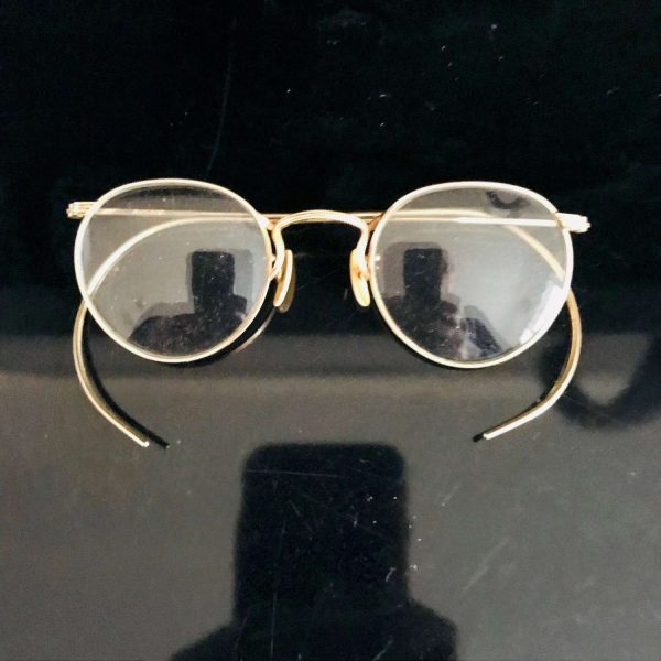 Vintage Large brass rimmed eyeglasses with glass intact single vision 4 1/4" across