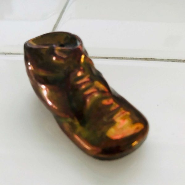 Vintage miniature bronze look baby shoe collectible porcelain