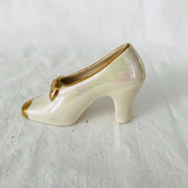 Vintage Miniature Shoe Figurine Iridescent ivory with gold trimmed toe and bow collectible display high heel fine china