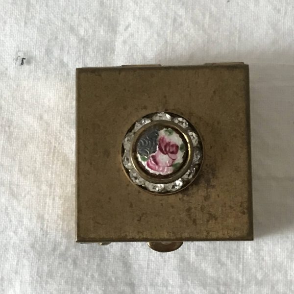 Vintage pillbox brass with raised enameled flower and surrounded with rhinestones purse handbag accessory collectible display vanity