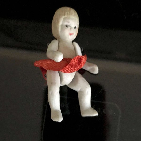 Vintage Porcelain Baby Doll Wire Connected arms and legs yellow hair Miniature Mid Century Japan collectible