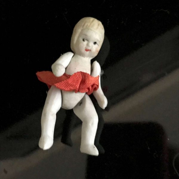 Vintage Porcelain Baby Doll Wire Connected arms and legs yellow hair Miniature Mid Century Japan collectible