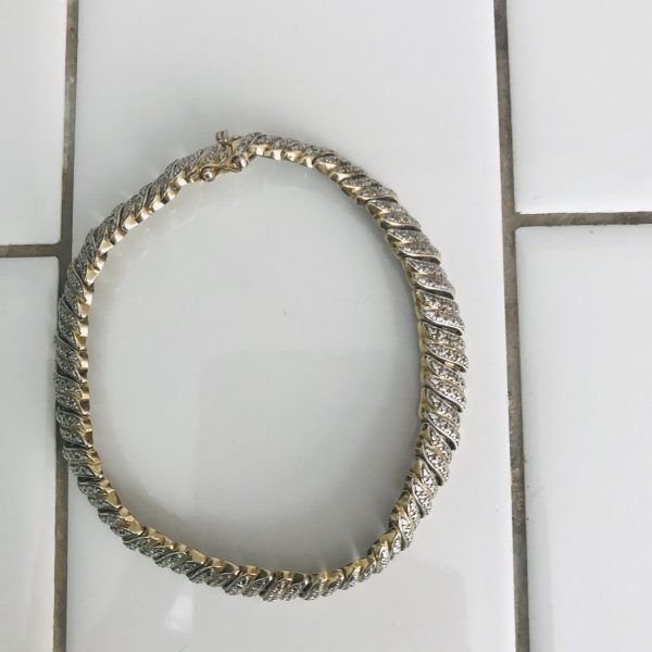 Vintage Sterling silver bracelet 19.8 grams with diamonda and some gold wash double safety clasps slide closure