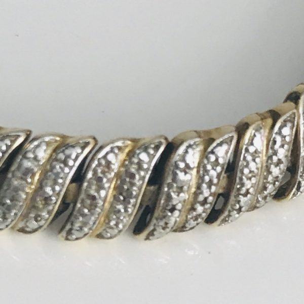 Vintage Sterling silver bracelet 19.8 grams with diamonda and some gold wash double safety clasps slide closure