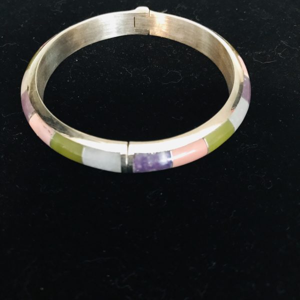 Vintage Sterling Silver jewelry bangle with inset polished stones 2 3/8" across opening spring clip closure
